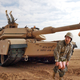 Spc. Bartowsky leads an unlikely formation in the Iraqi desert.